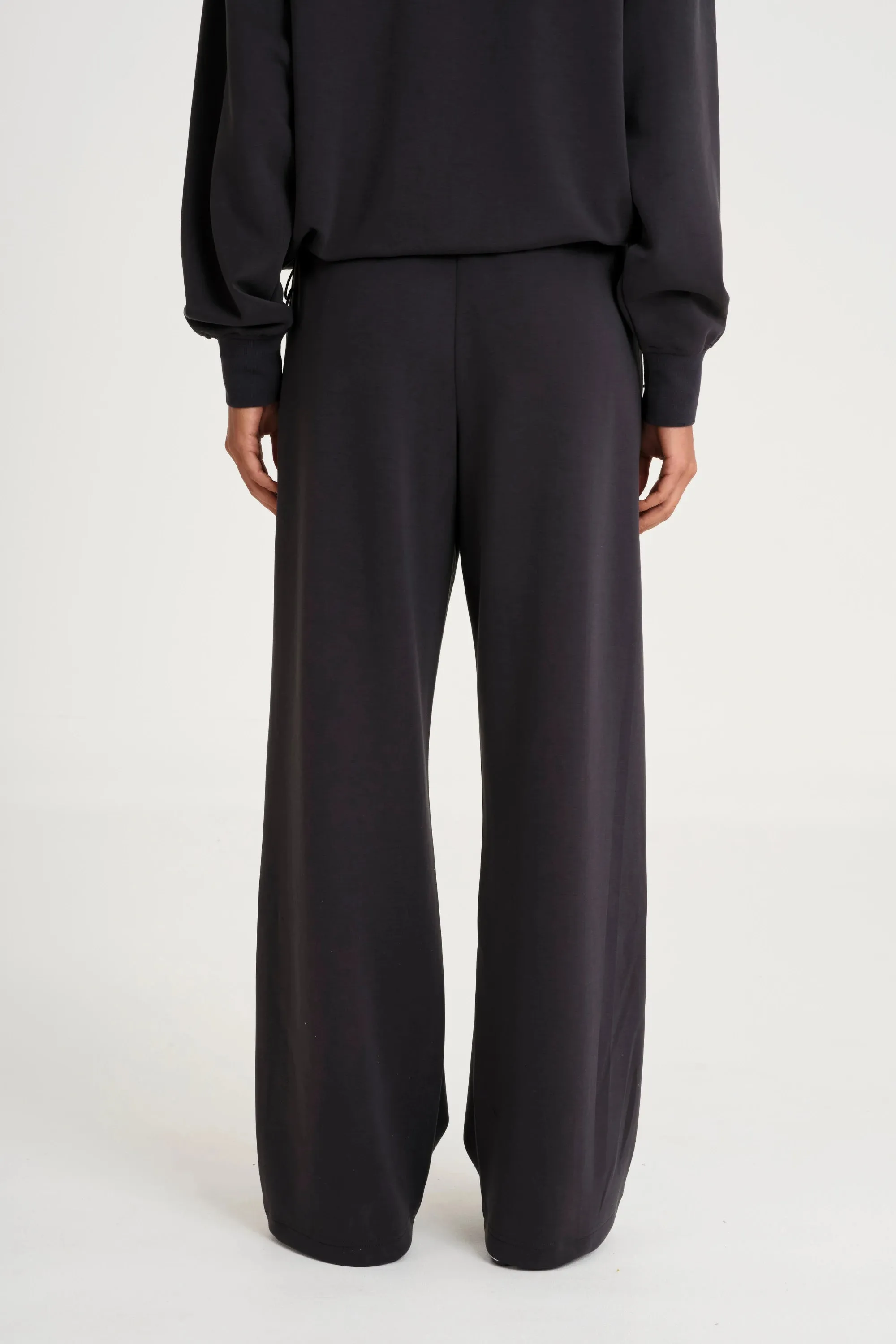Soft Luxury Wide Leg Track Pant Smart Layering Low Profile Fasteners